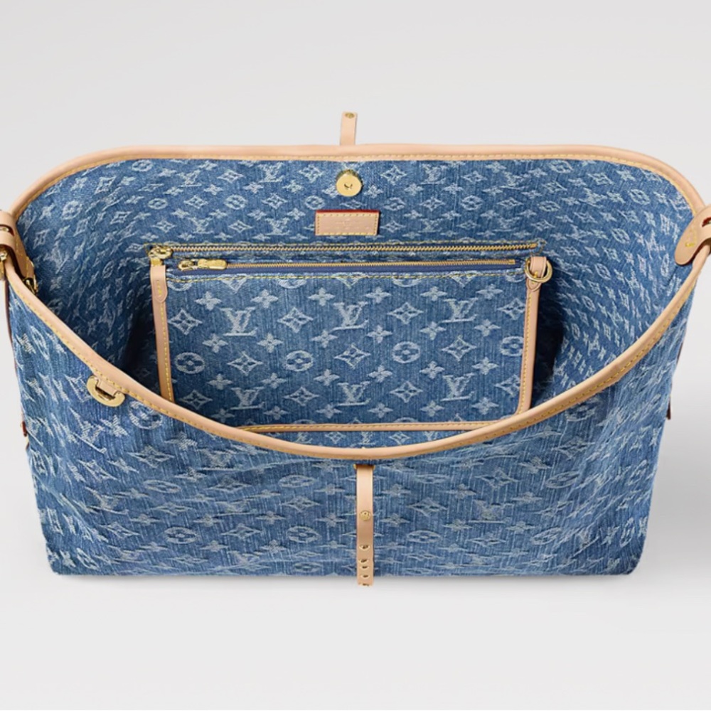 Brand new rare Carry on MM Authentic denim Louis  Vuitton purse. Limited edition